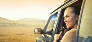 woman in a car discovering Albuquerque