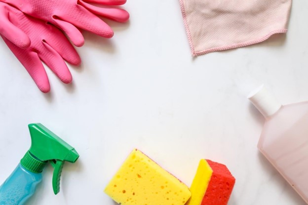 Cleaning materials on a white surface